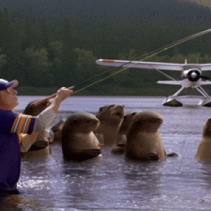 Hailuo_Video_A man wearing a UW jersey flyf_403538660378169351.gif